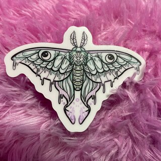 Glowing moth sticker