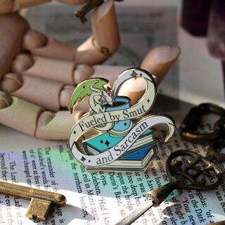 smut and sarcasm enamel pin