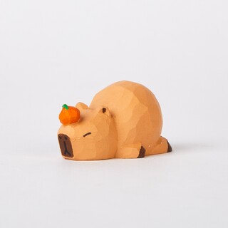 Cabu Carved Wooden Sleepy Capybara Balancing an Orange