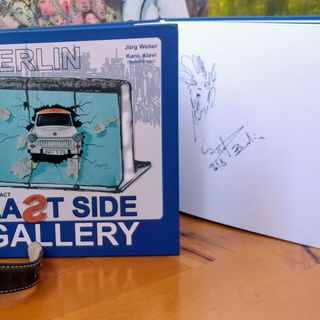Photo Book of the East Side Gallery hand signed by Kani Alavi, Executive Director