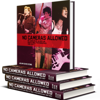 1 additional signed first edition of No Cameras Allowed