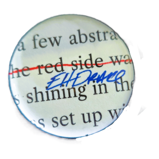 Signed Piece of The First Draft in a Button