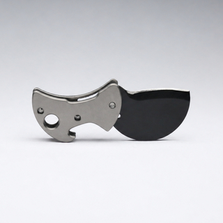COiN: Titanium / M390 Blackout Razor