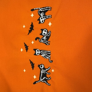 Glow in the Dark Skeleton Cats on orange or purple pin banner