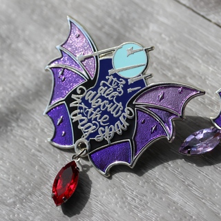 All about the wingspan enamel pin