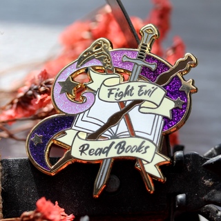 Fight evil, read books enamel pin