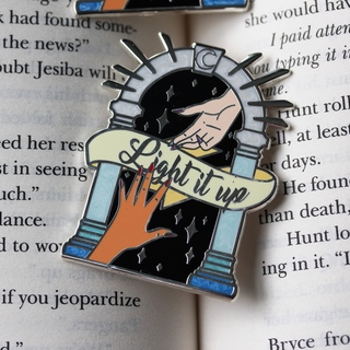 Light it up enamel pin