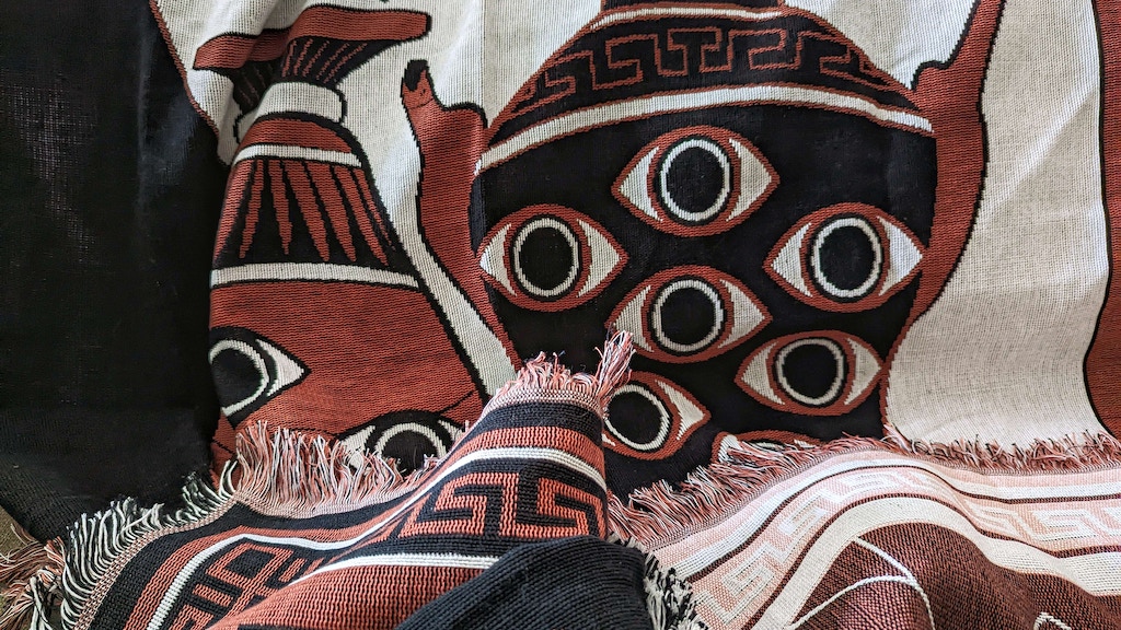 "Eyes of Antiquity" Woven Blanket