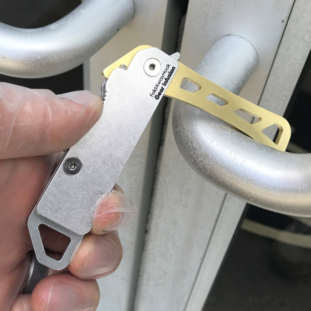 FoldAwayHook: Folding Brass Door Opener Tool